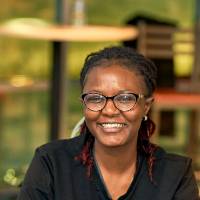 International Anchor Allies Winter 2026 First Mixer - big smile on the face of a student